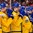BUFFALO, NEW YORK - JANUARY 5: Team Sweden players bow their heads in disappointment following their 3-1 loss to Canada in the gold medal game of the 2018 IIHF World Junior Championship. (Photo by Andrea Cardin/HHOF-IIHF Images)

